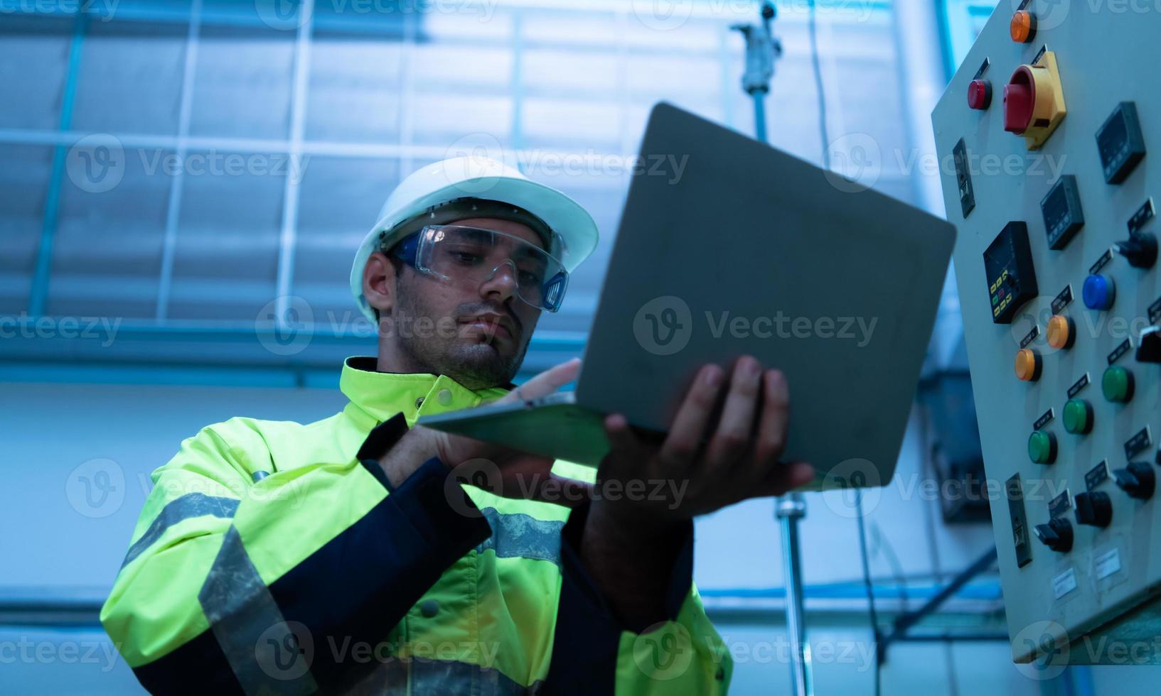 Chief Engineer of Mechanical Plant Checking the electronic circuit of the machine to check readiness photo