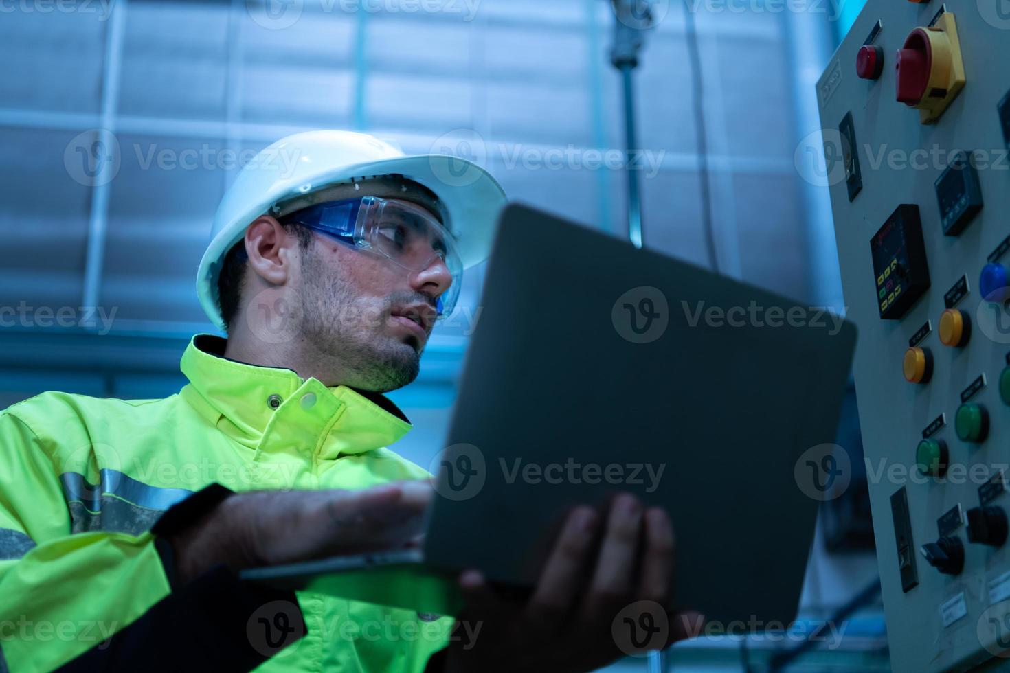 Chief Engineer of Mechanical Plant Checking the electronic circuit of the machine to check readiness photo