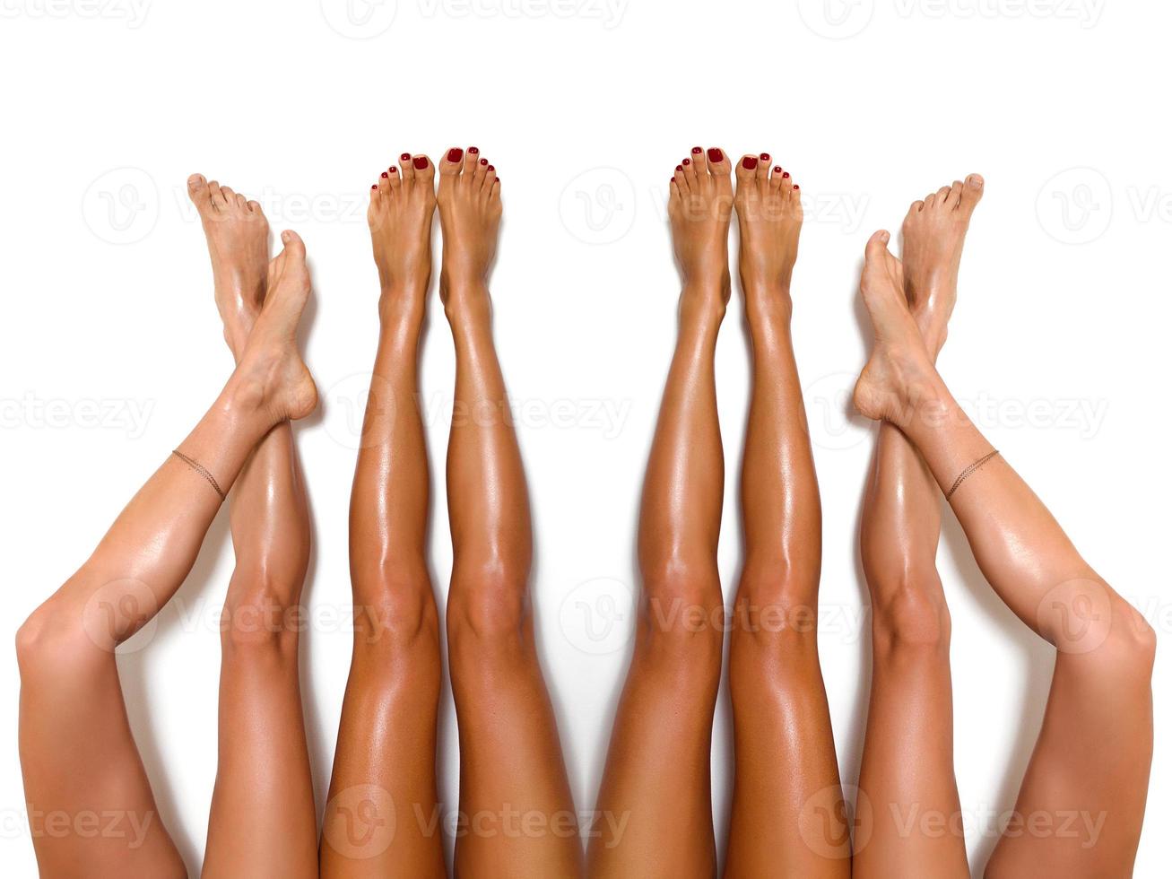 Group of beautiful, smooth women's legs after laser hair removal. Treatment, technology concept photo