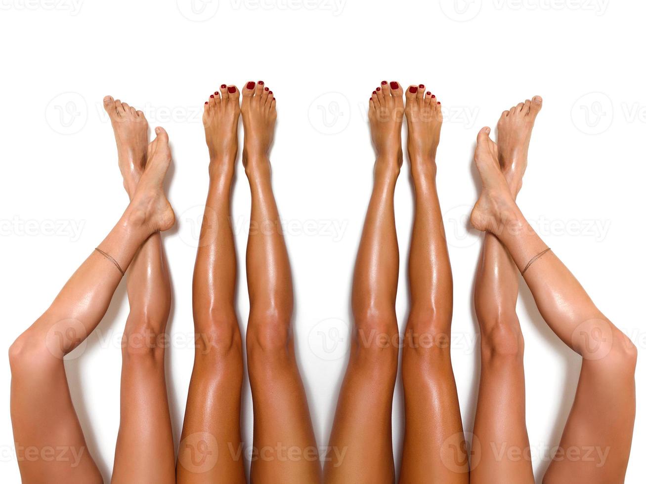 Group of beautiful, smooth women's legs after laser hair removal. Treatment, technology concept photo