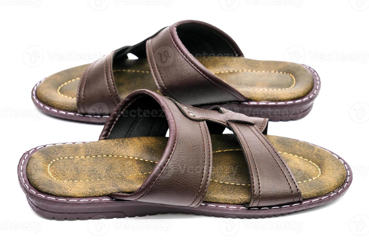Brown leather slippers isolated on white background photo