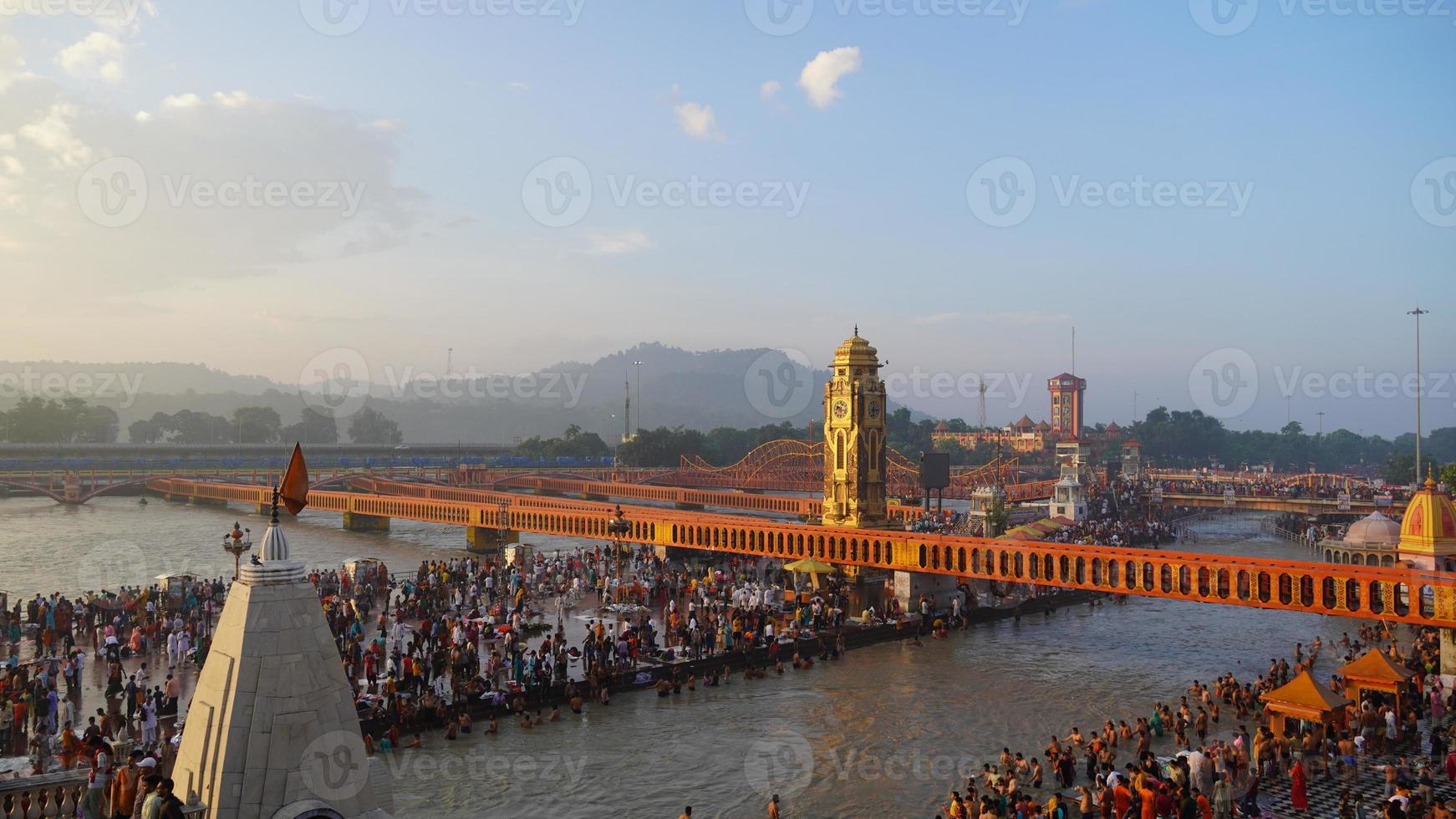 beautiful image of holy river with many people. photo