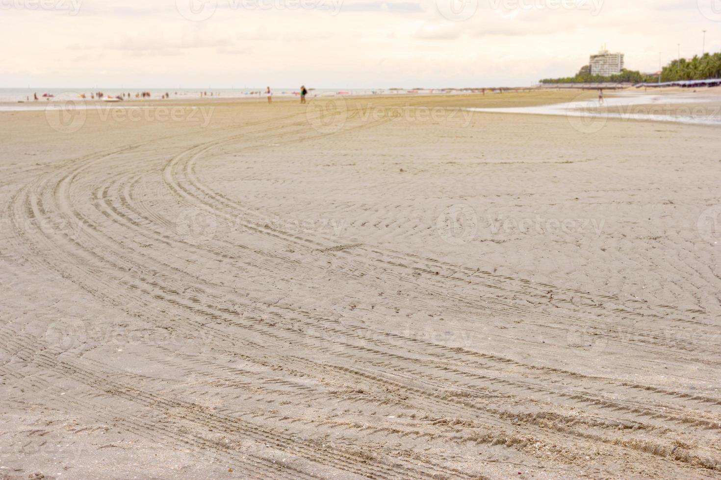 prints of tires on beach,abstract background photo
