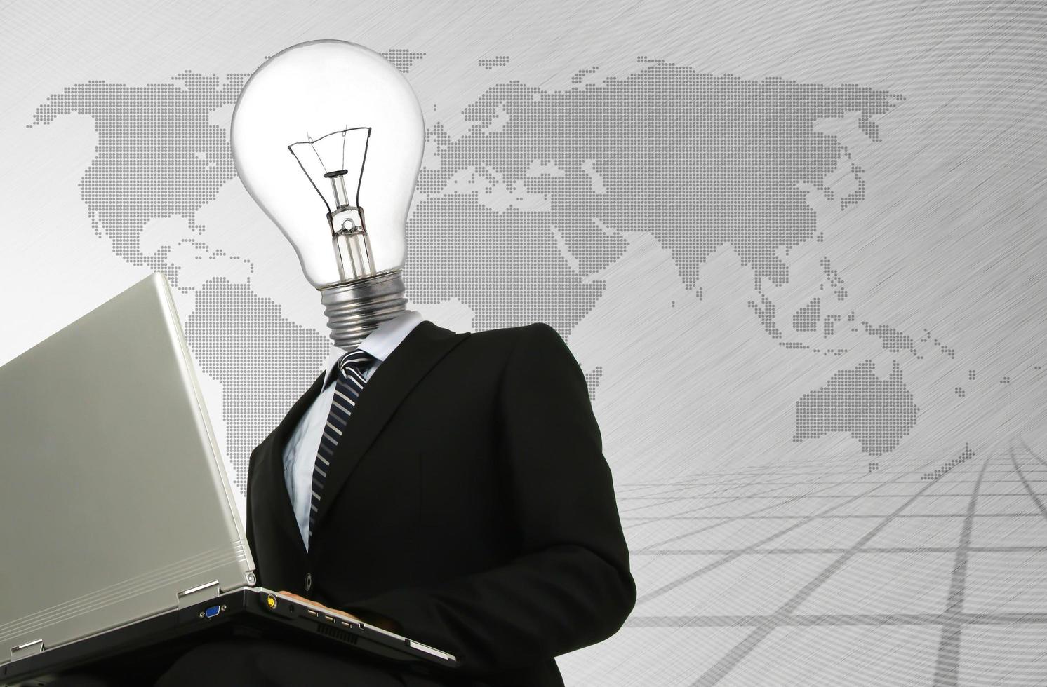 lamp head businessman with laptop in his hands photo