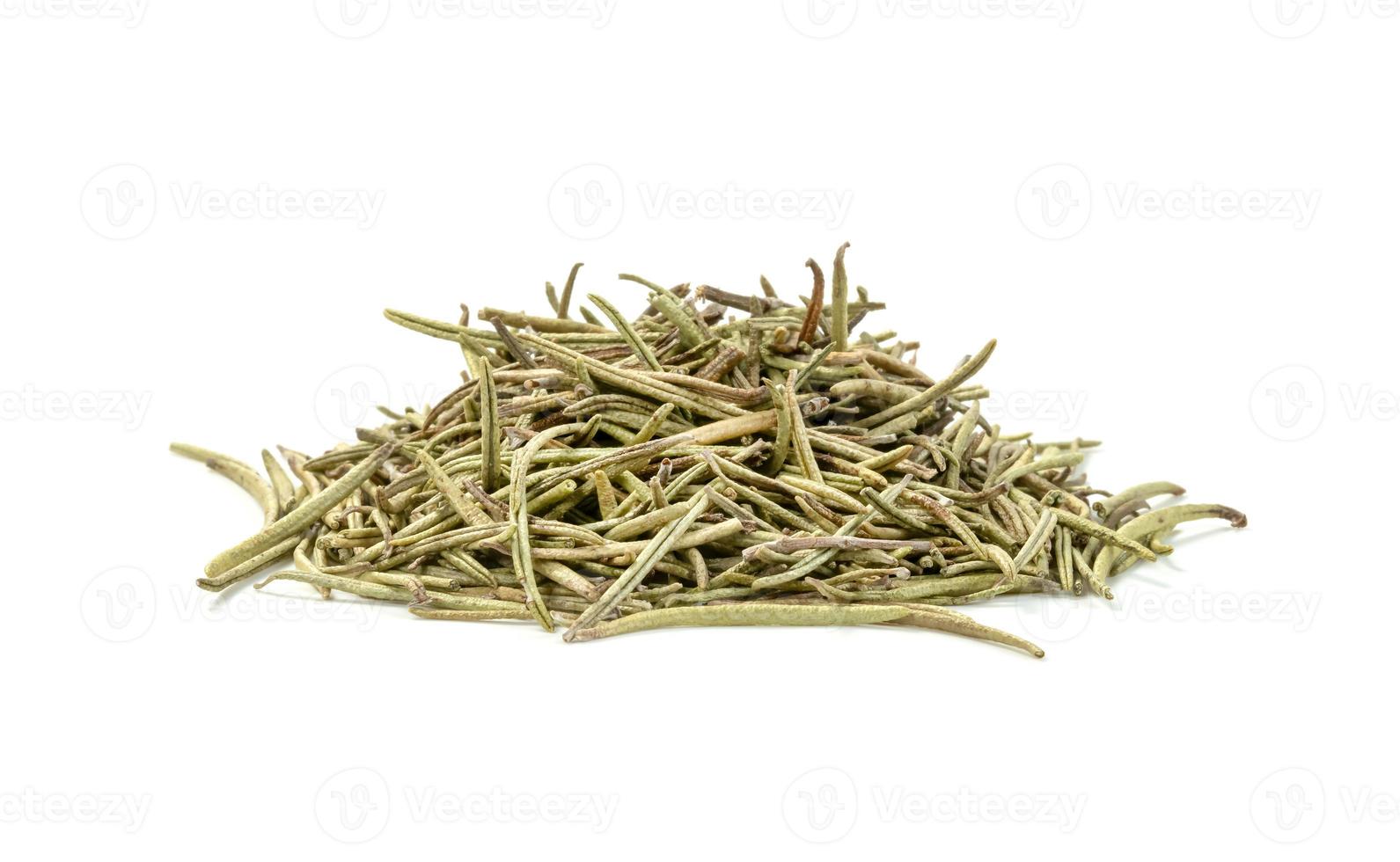 Dry rosemary pile isolated on white background photo