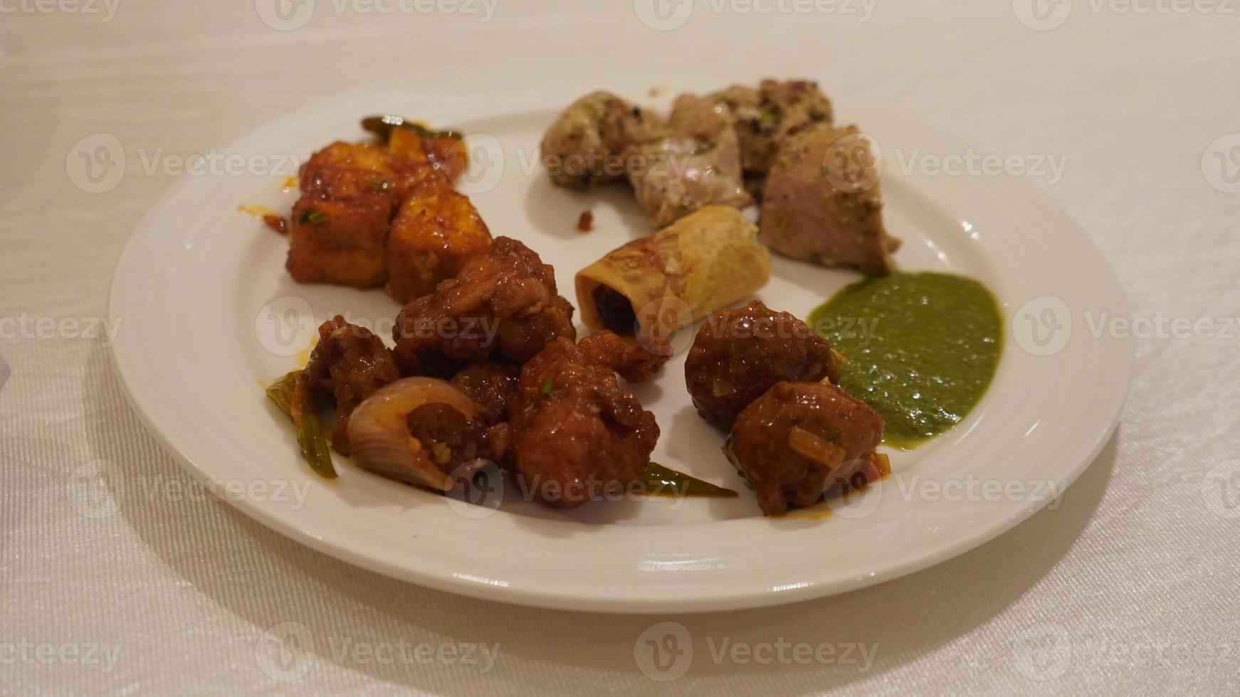 snacks in white plate image hd. photo