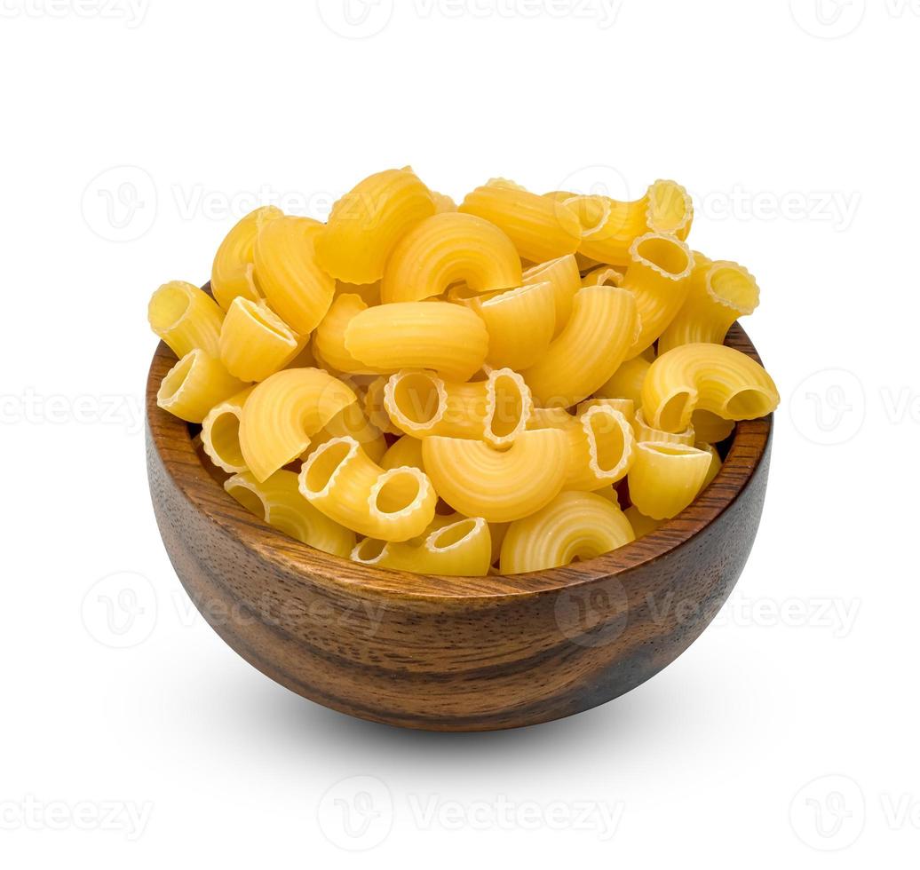 raw macaroni pasta with wooden bowl isolated on white background photo