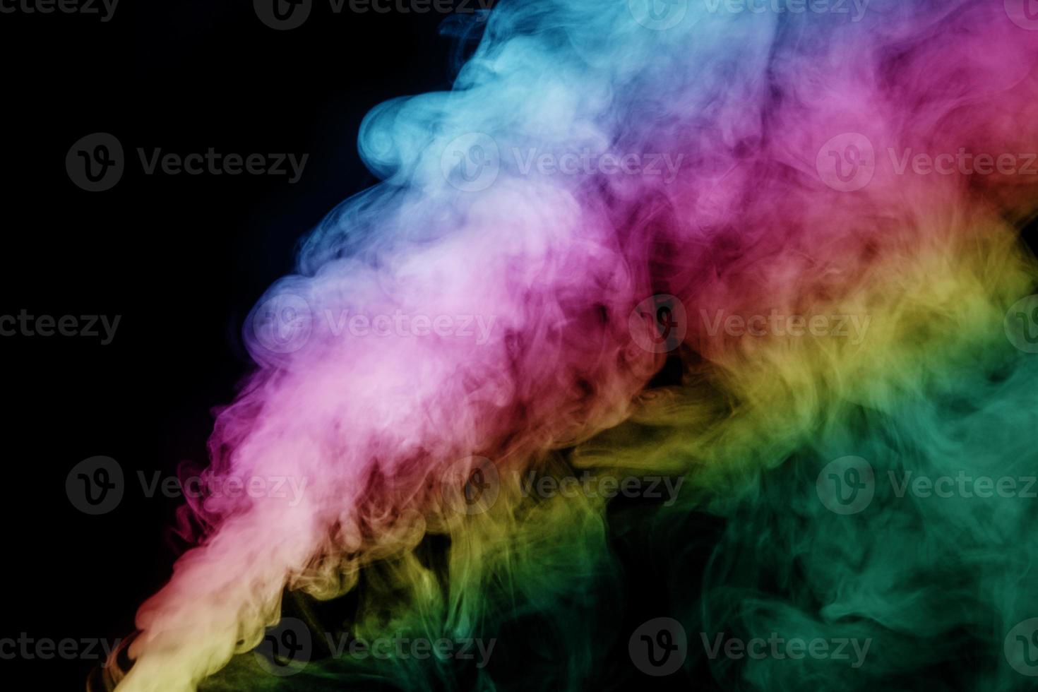 Abstract smoke isolated on black background,Rainbow powder photo
