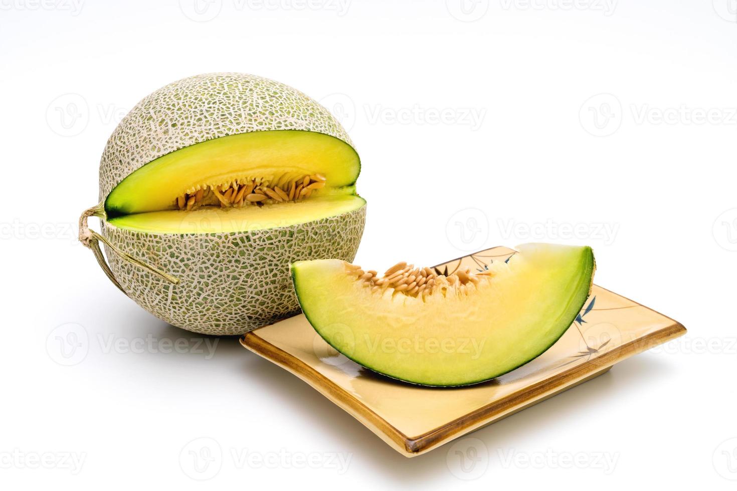 green melon isolated on white background photo