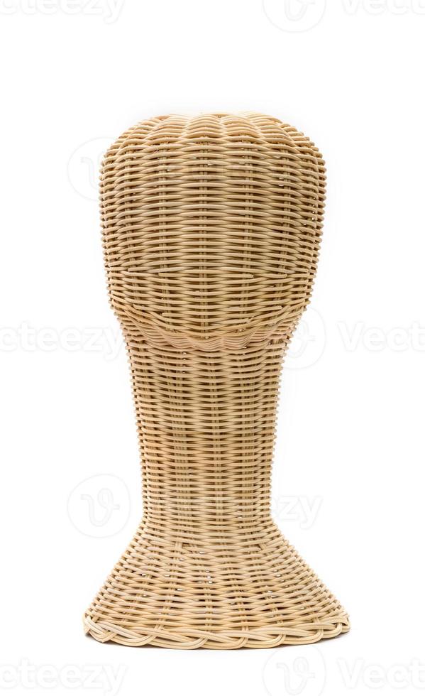 Mannequin head for wig with rattan isolated on white background photo