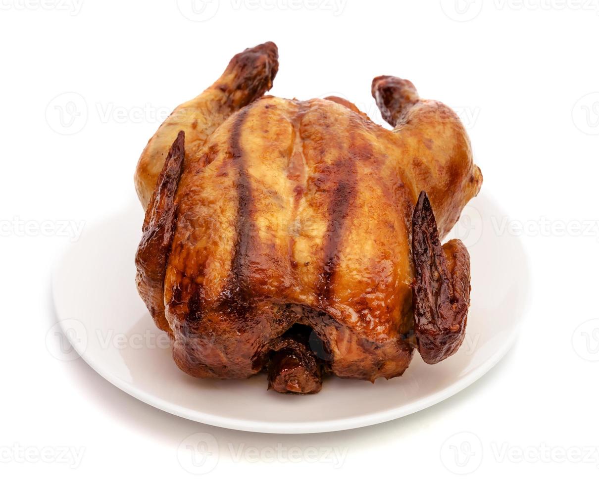 roasting chicken isolated on white background photo