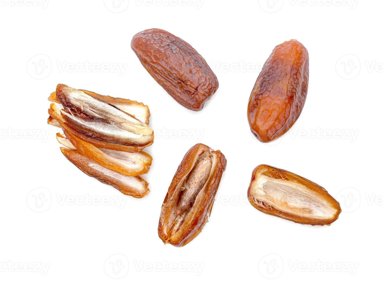 dry dates palm sliced isolated on white background. photo