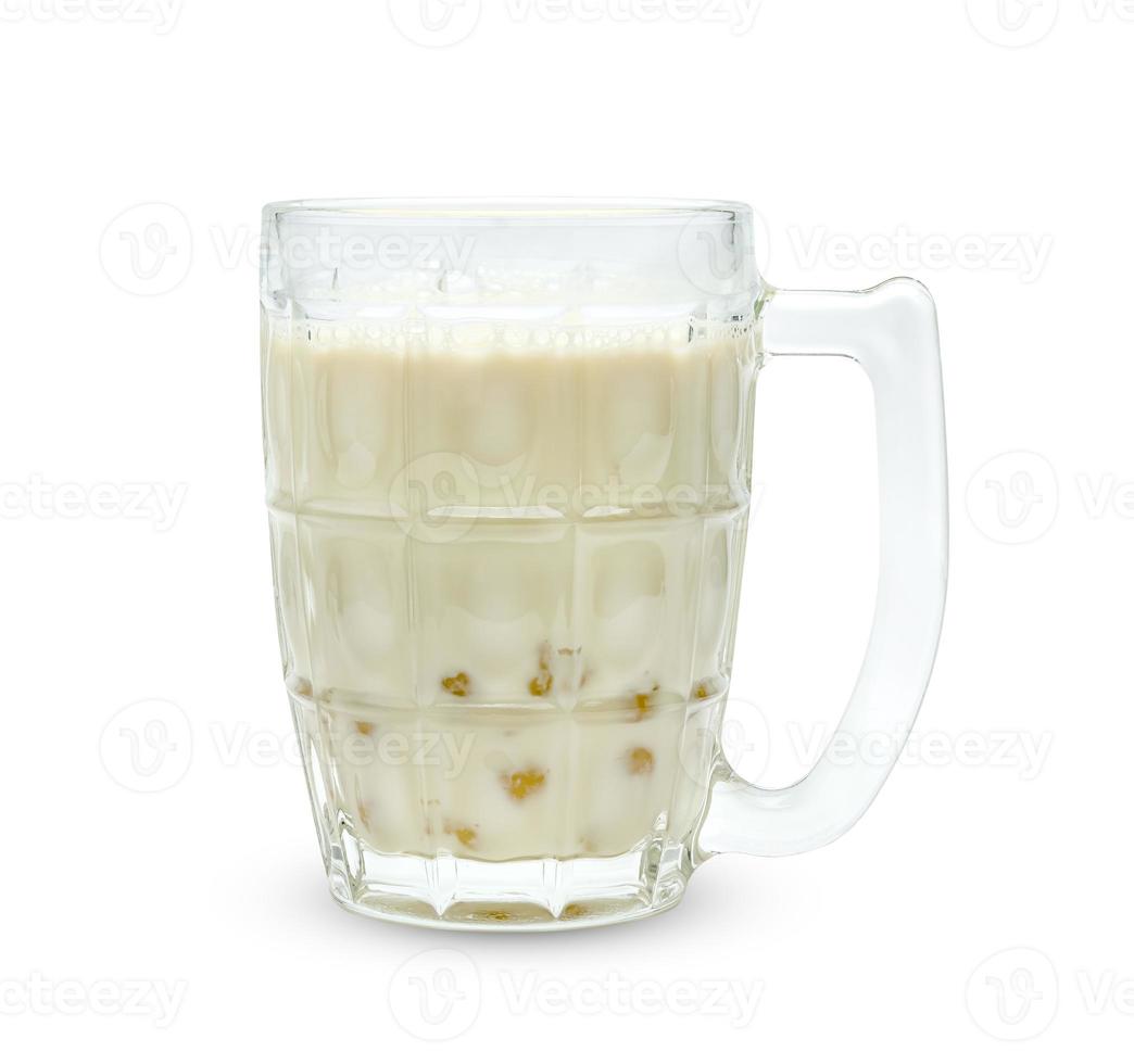 soybean milk and bubble foam in transparent glass isolated on white background ,include clipping path photo