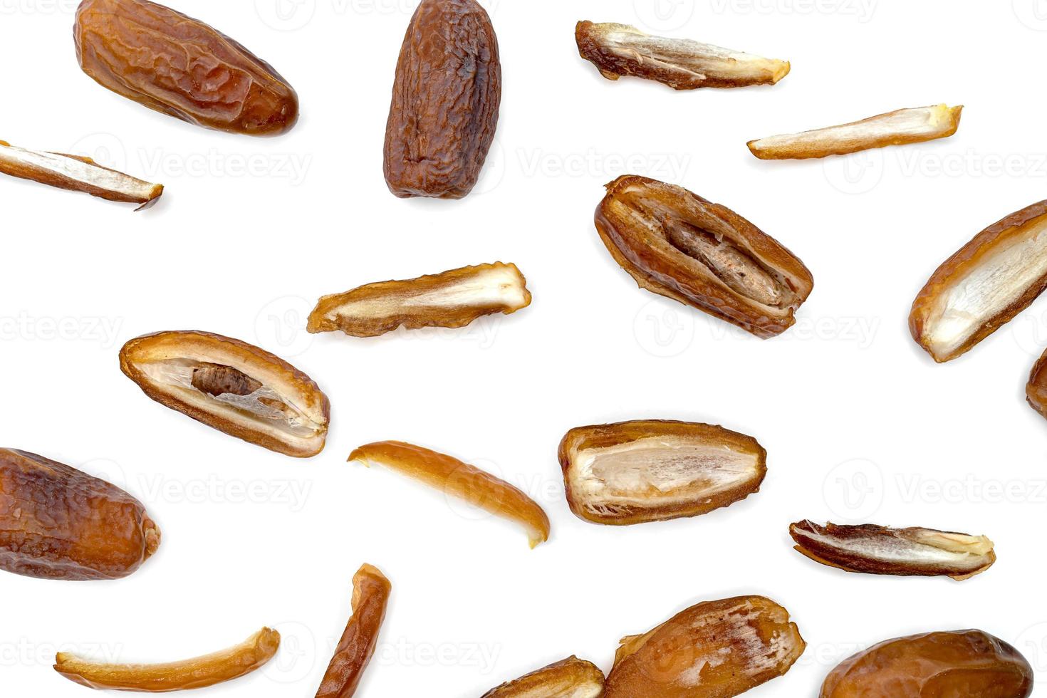 dry dates palm sliced isolated on white background. photo