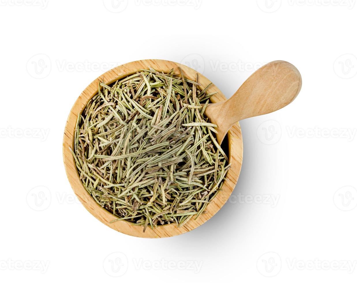 Dry rosemary in wooden bowl and spoon isolated on white background ,include clipping path photo