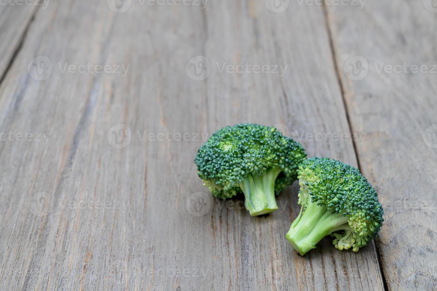 broccoli on wood background photo