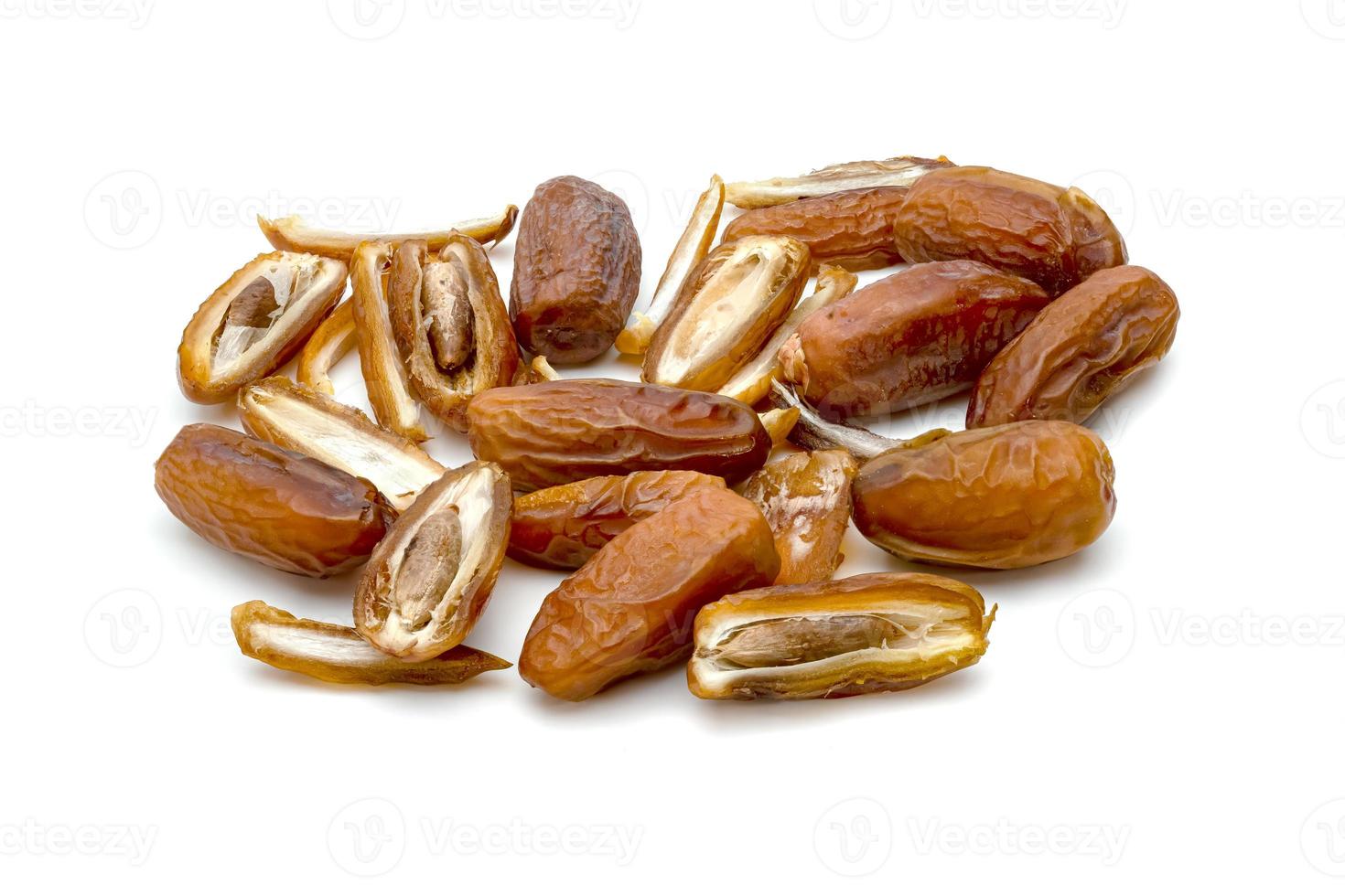 dry dates palm sliced isolated on white background. photo