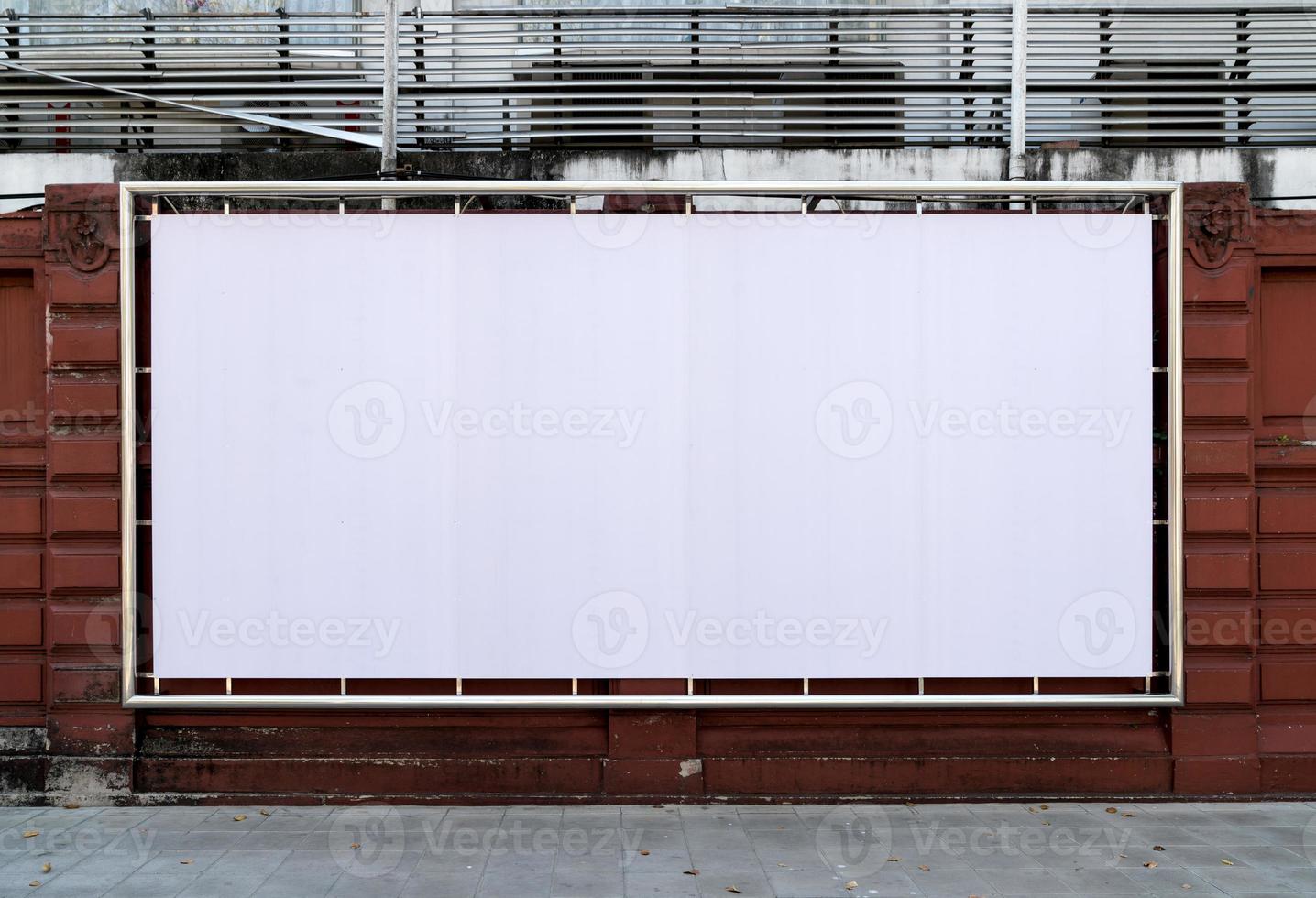 white billboards hanging on wall photo