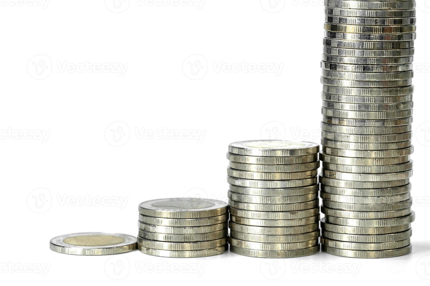 Coins stacks on white background photo