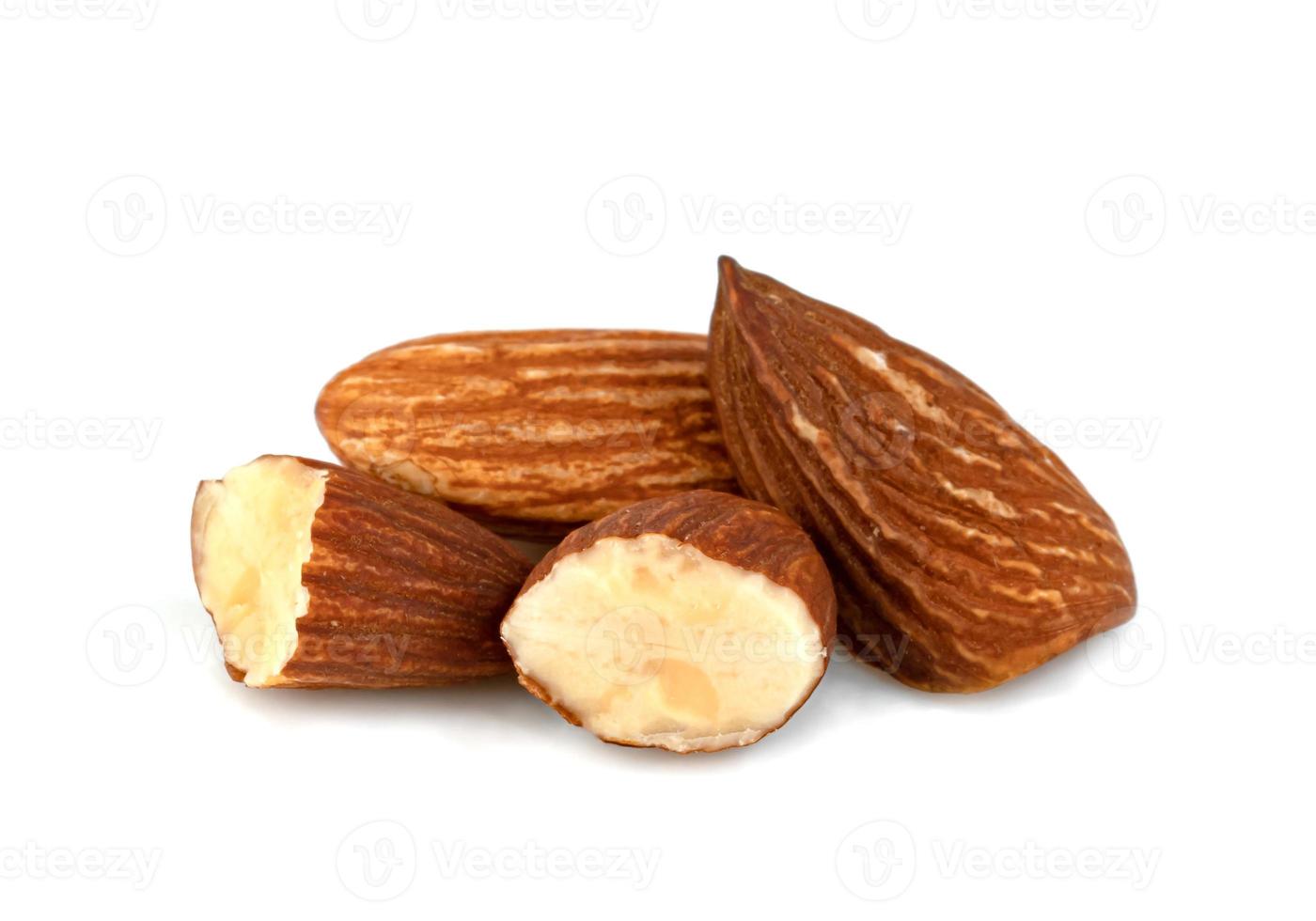 broken almonds natural roasted isolated on white background photo