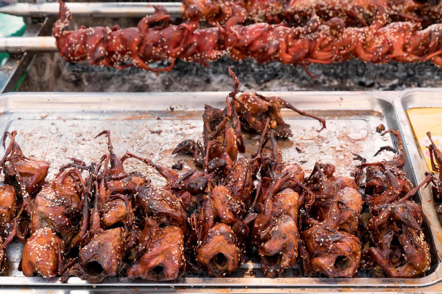 Chicken grilled with sesame on tray photo