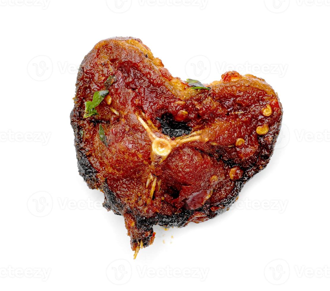 Stir Fried Crispy Catfish with Curry isolated on a white background photo