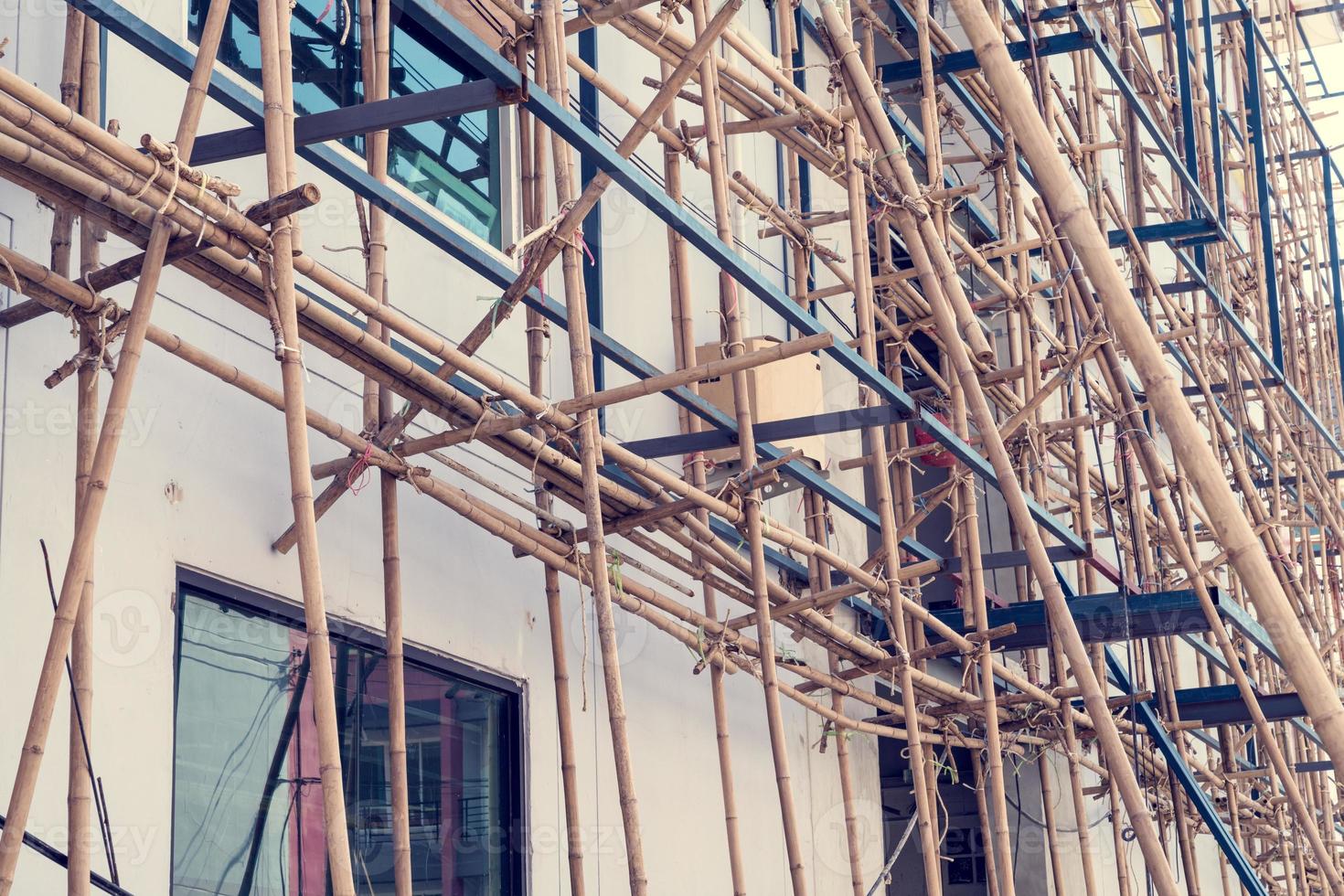 scaffolding at construction with wooden bamboo,Vintage Tone photo