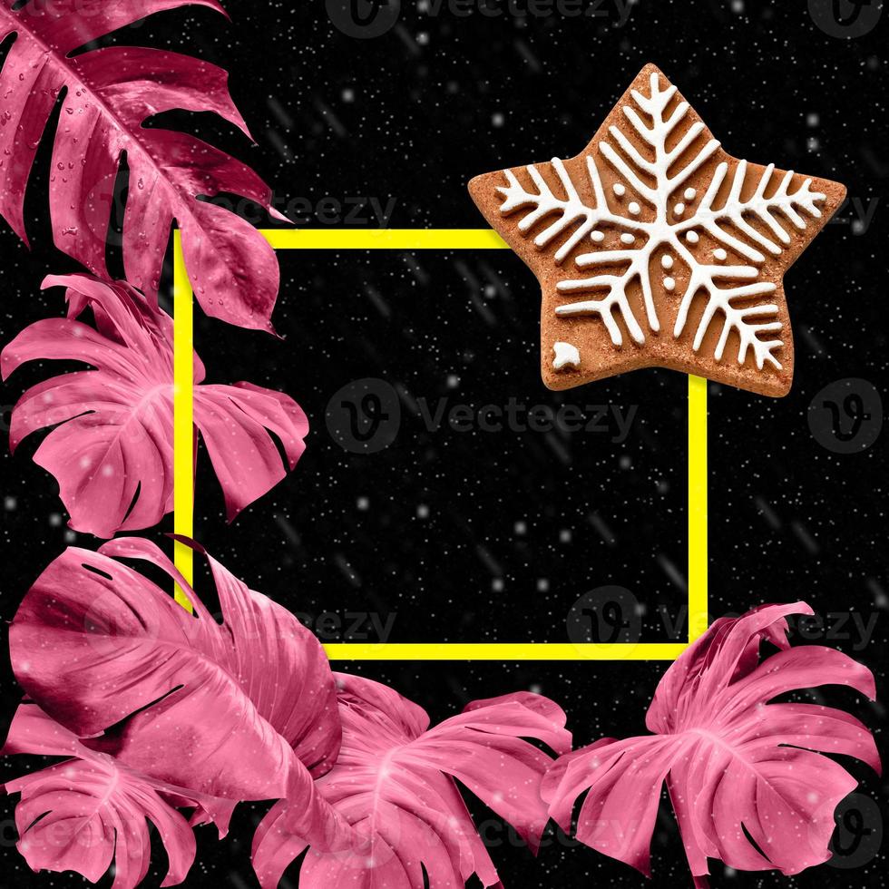 star with colorful monstera leaves pattern on black background for christmas and new year concept photo