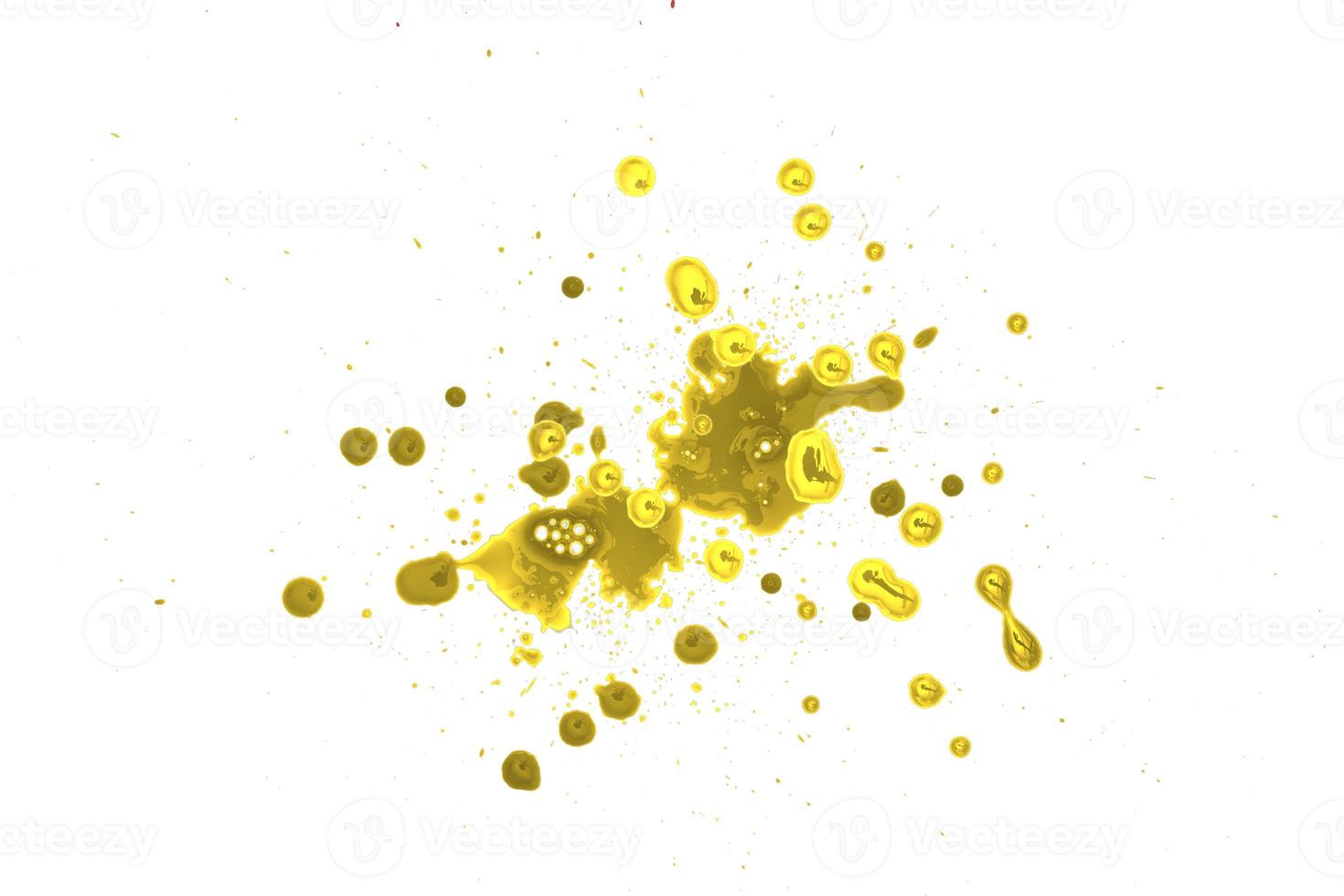 closeup drops of golden isolated on white background,abstract pattern photo