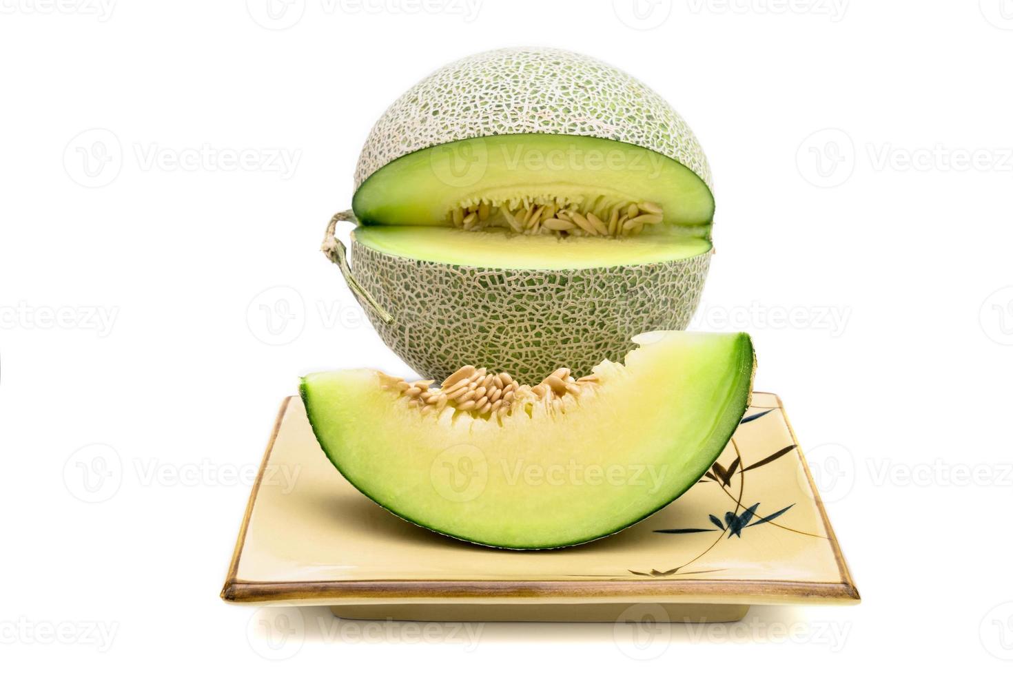 green melon isolated on white background photo