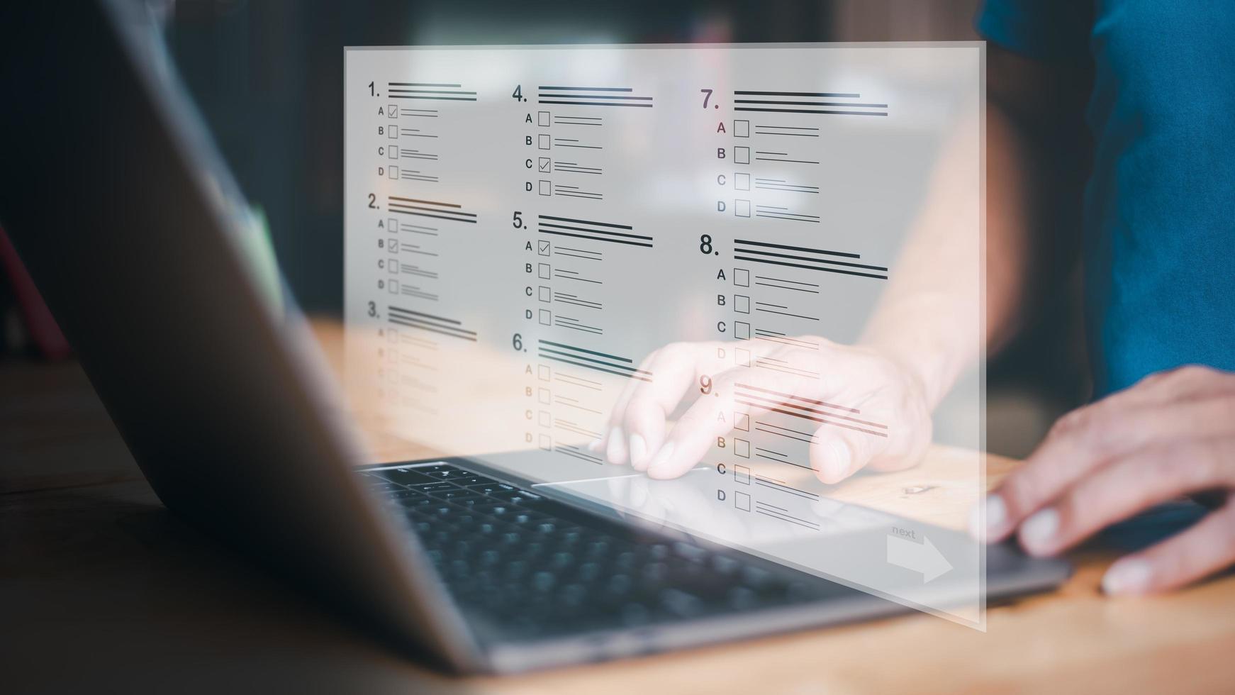 Students take online quizzes through the university website, knowledge testing concepts, fill out application forms, competence assessments, and online learning. photo