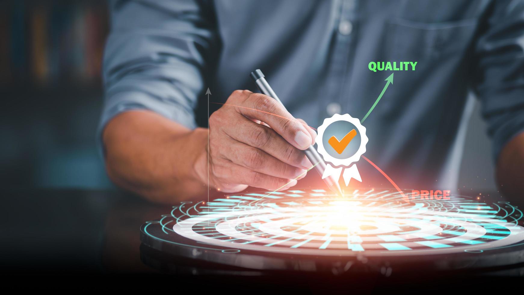 businessman uses a pen to set product development goals. with an emphasis on better quality and lower prices. best quality business ideas Improve and service excellence to develop industry standards photo