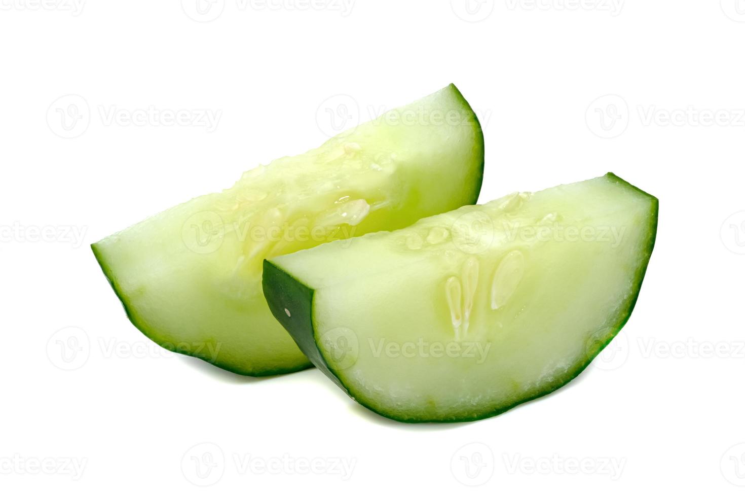 Fresh japanese cucumber sliced isolated on white background photo
