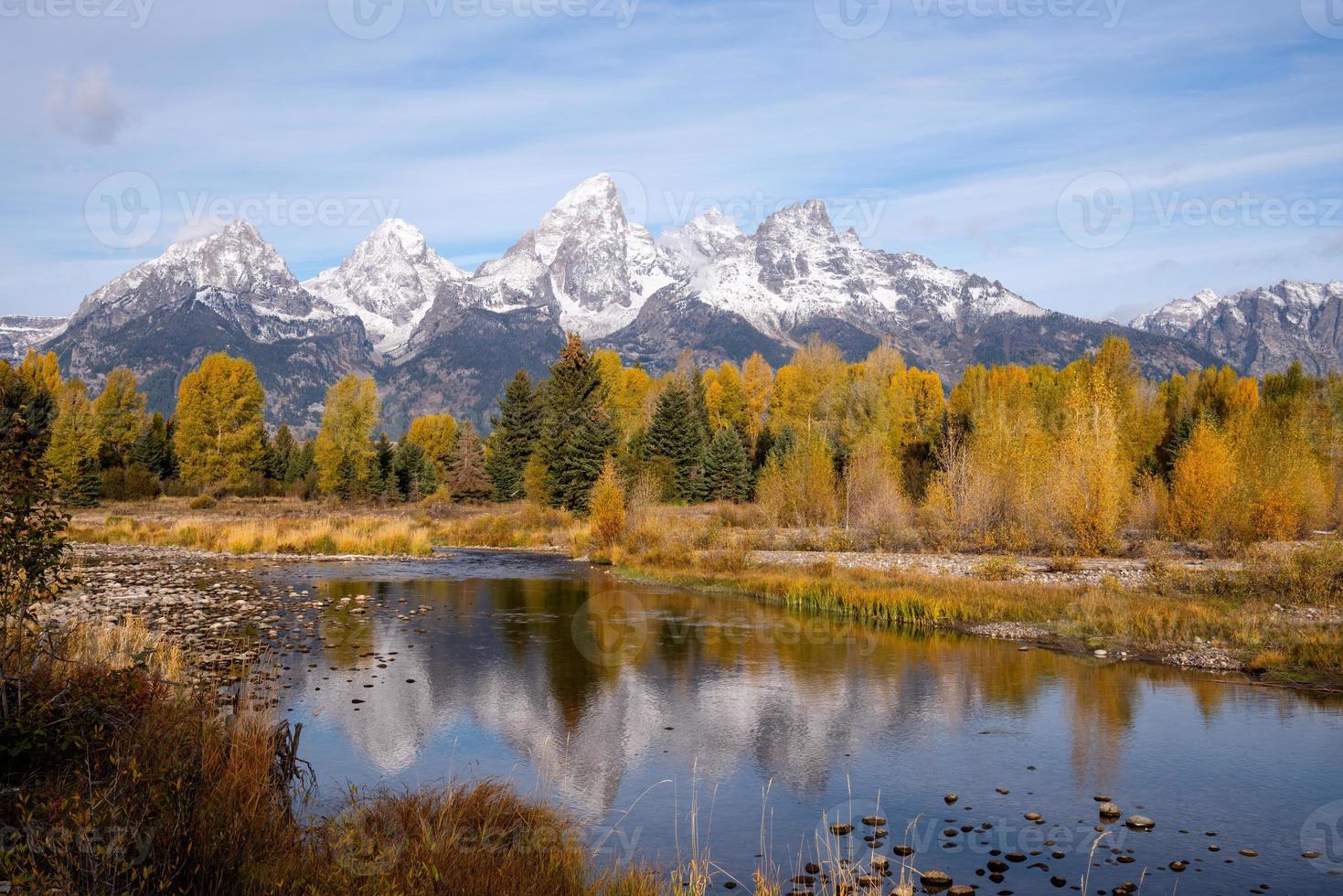 Autumnal colours along the Snake river in Grand Teton National Park photo