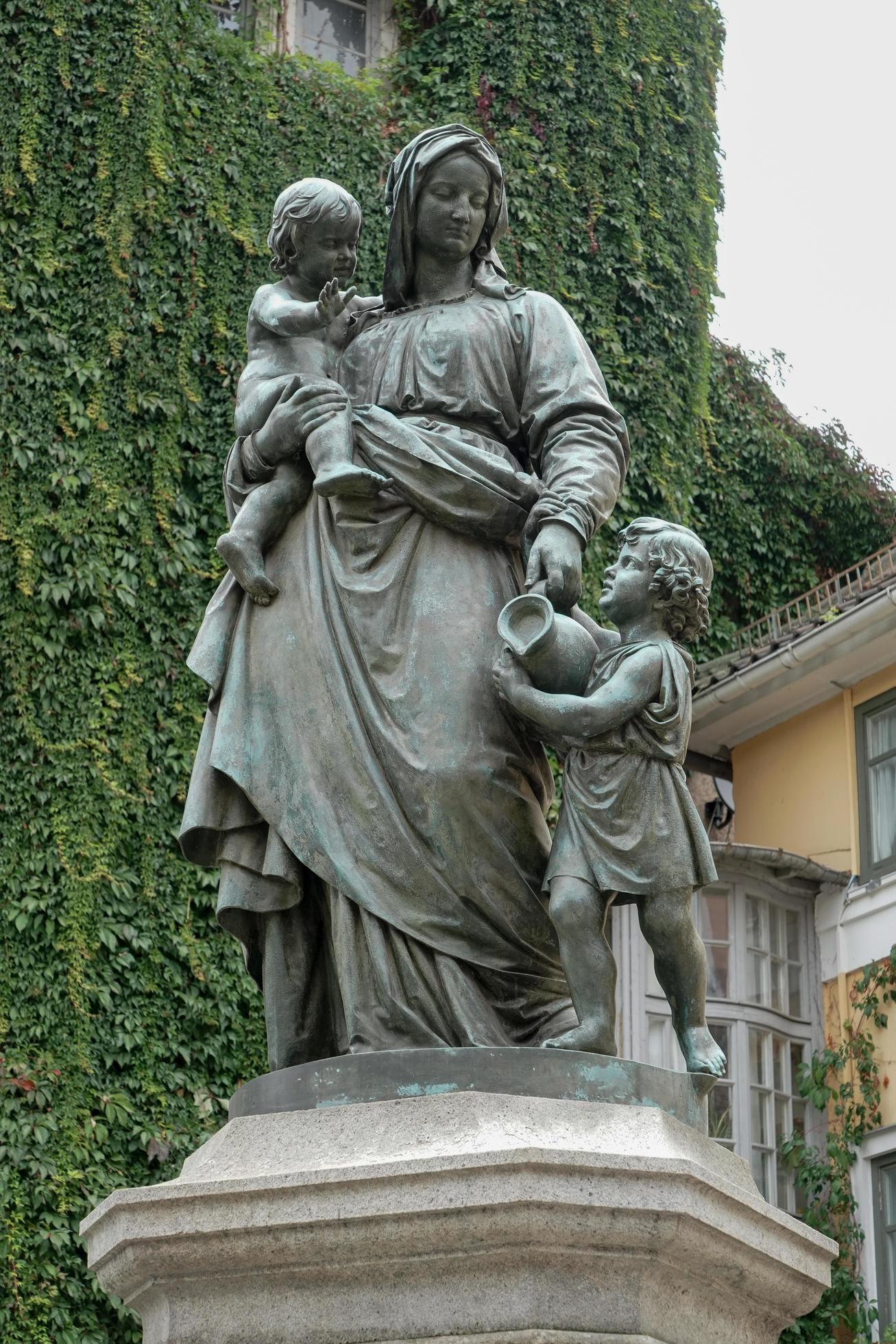 Weimar, Germany, 2014. Mother's Love statue at the Donndorf fountain in