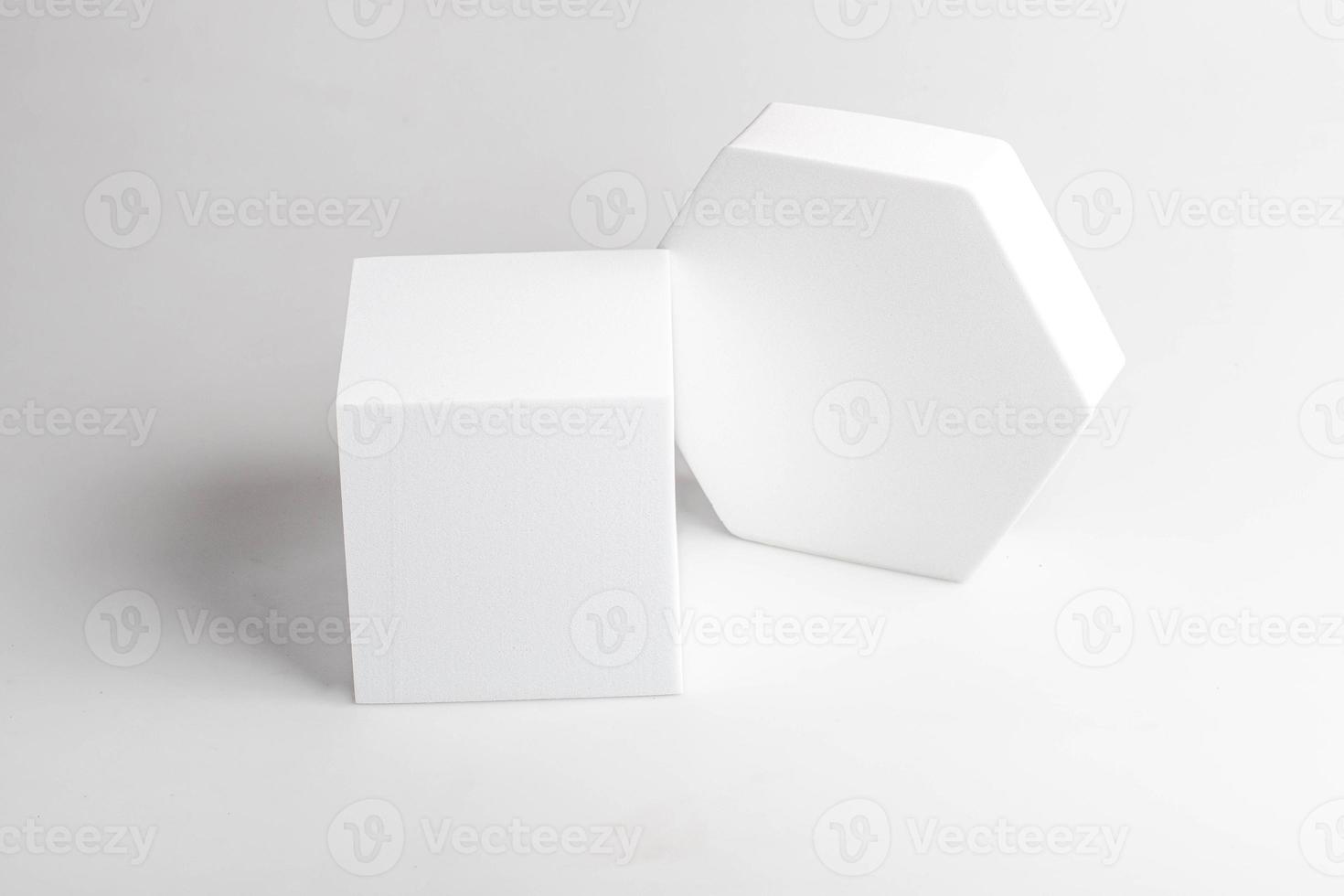 White product stand, mock up on a white background texture background Ideal backdrop for product presentations, exhibitions and mockups. photo