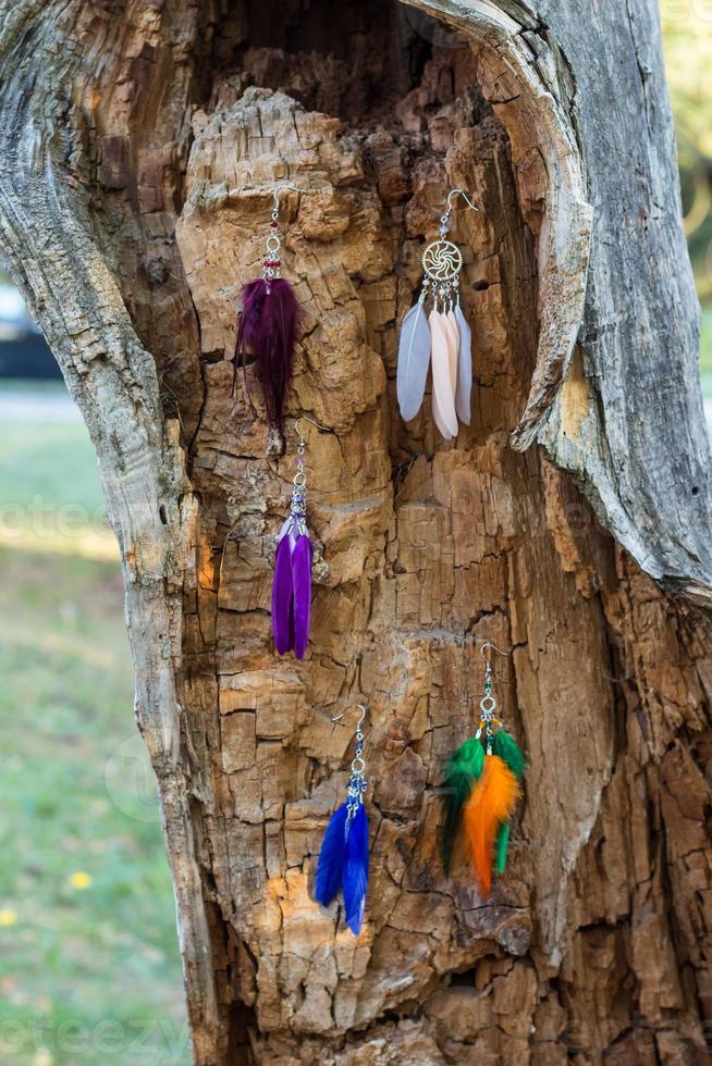 earrings of Handmade dream catcher with feathers threads and beads rope hanging photo