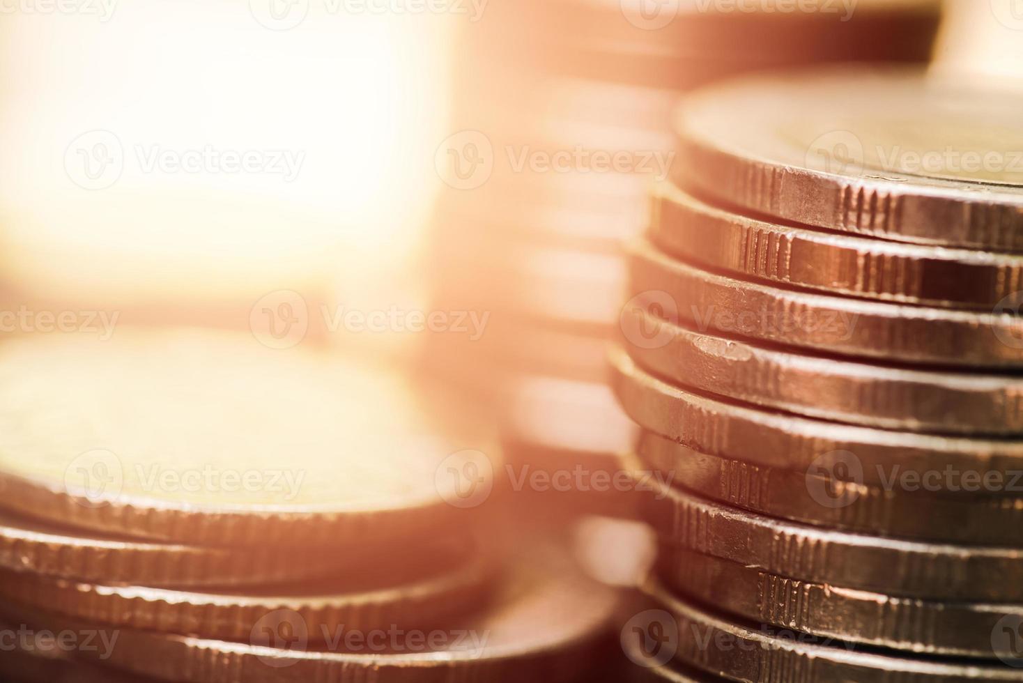 Coins stacked on each other close up picture, market crisis and financial aid concept photo