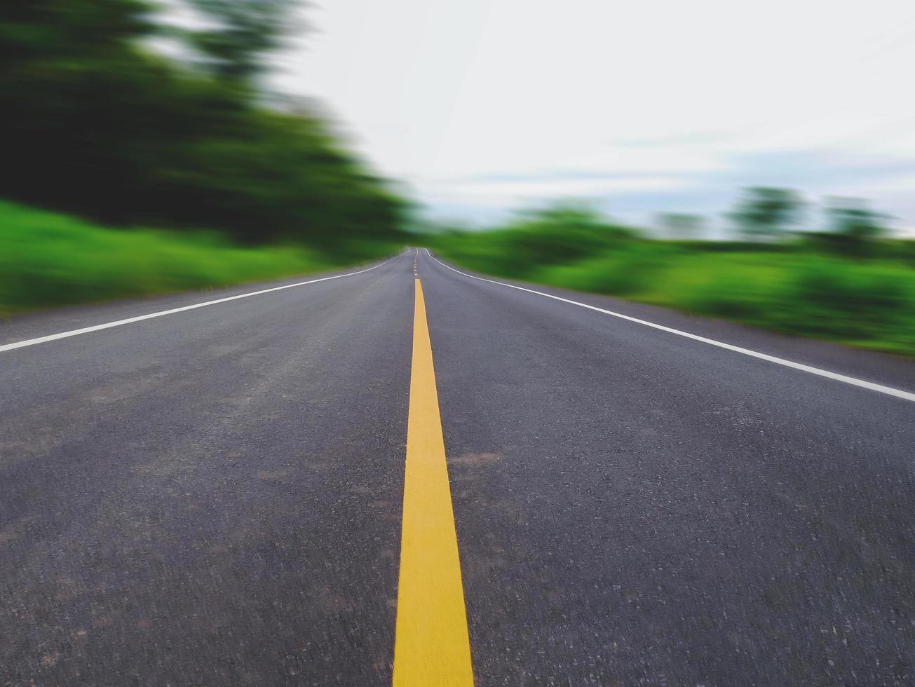 New Road in beautiful country road With green grass field fields on both sides hi-speed road on the way photo