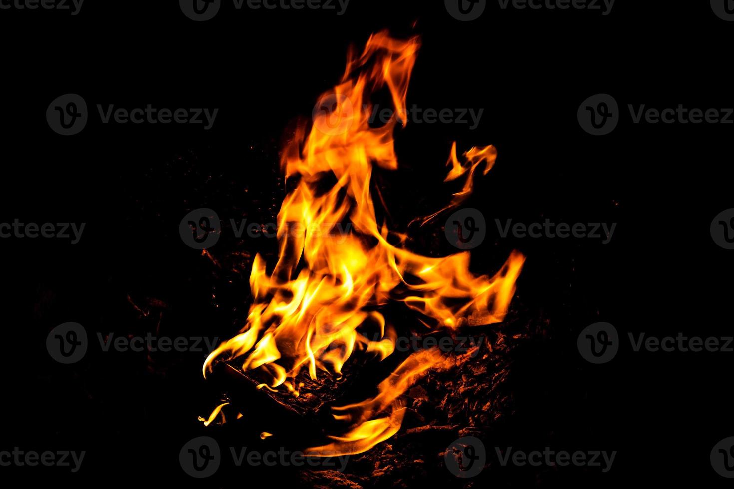 Fire flame texture. Burning material backdrop. Burn effect pattern. Blaze and torch wallpaper. Heat and haze backdrop. photo