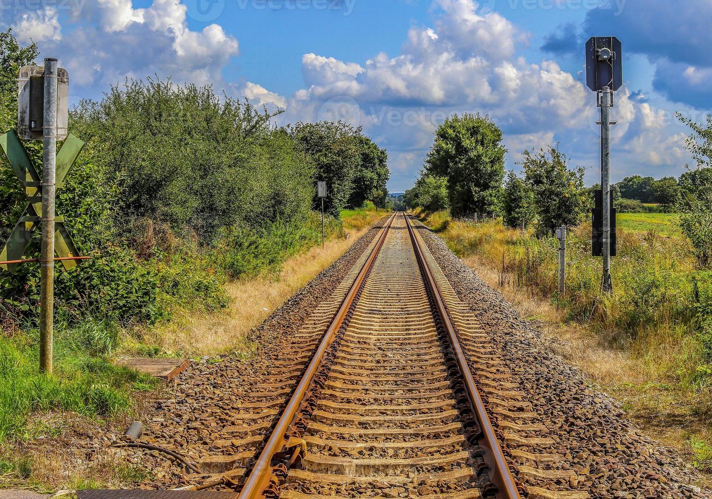 Multiple railroad tracks with junctions at a railway station in a