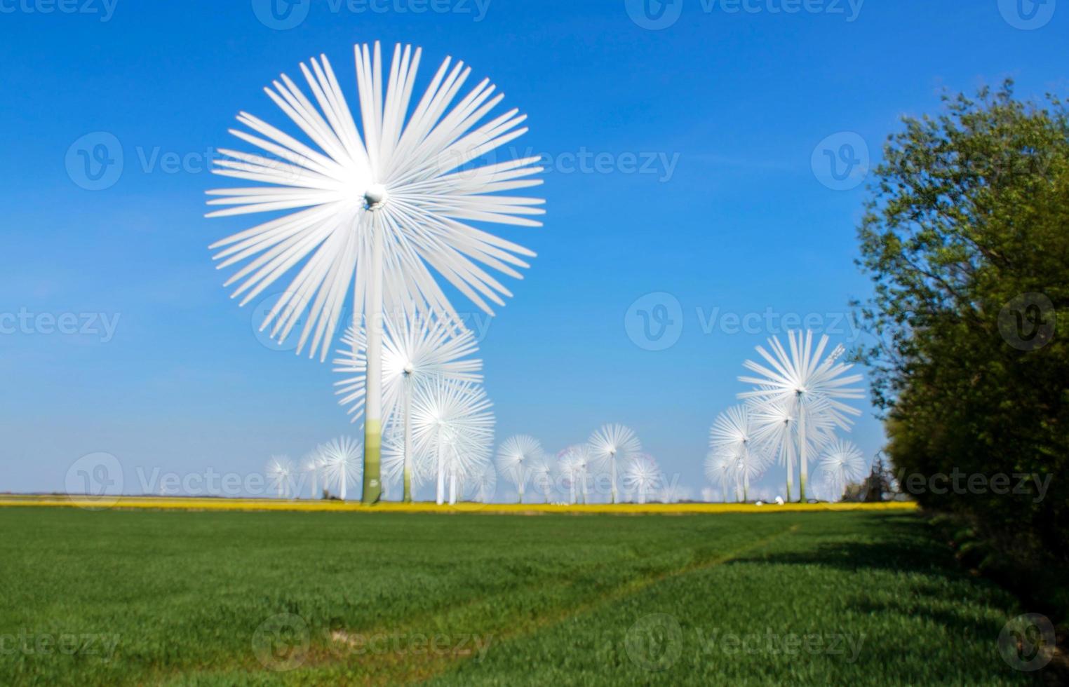 Panoramic view on alternative energy wind mills in a windpark with mulitple images blended photo