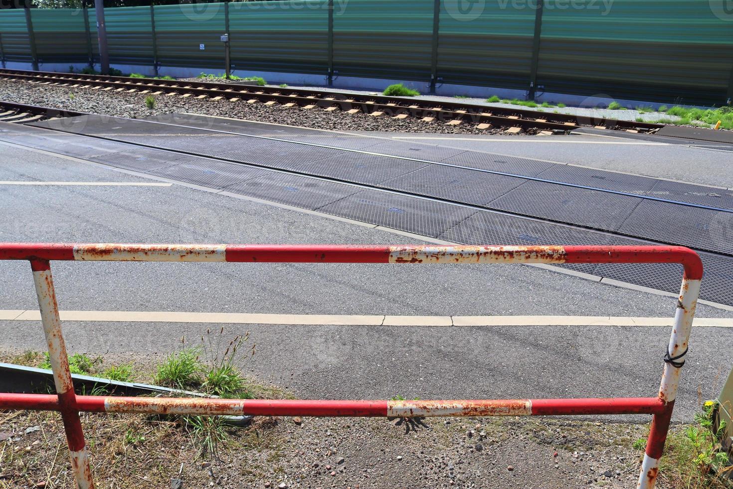Multiple railroad tracks with junctions at a railway station in a perspective and birds view photo