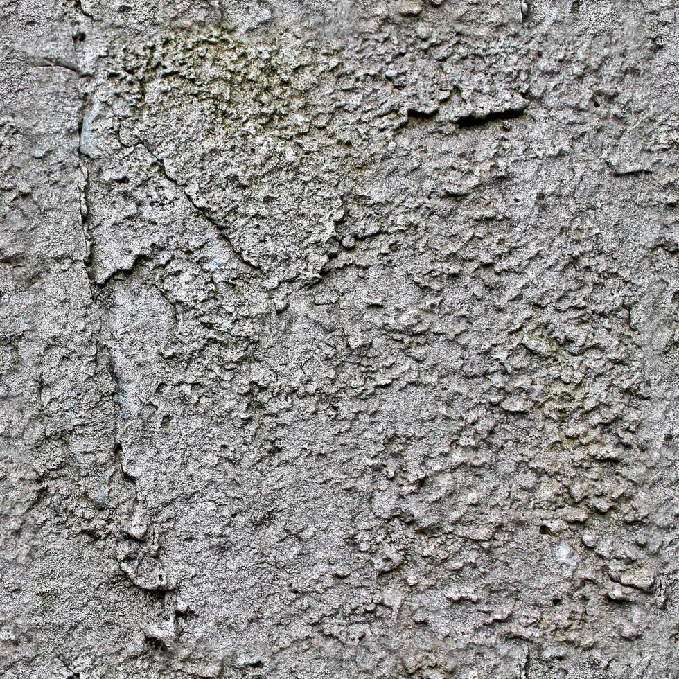 Photo realistic seamless texture pattern of weathered concrete walls with cracks in high resolution.