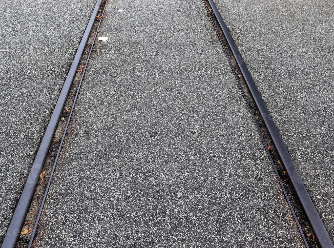 Multiple railroad tracks with junctions at a railway station in a perspective and birds view photo