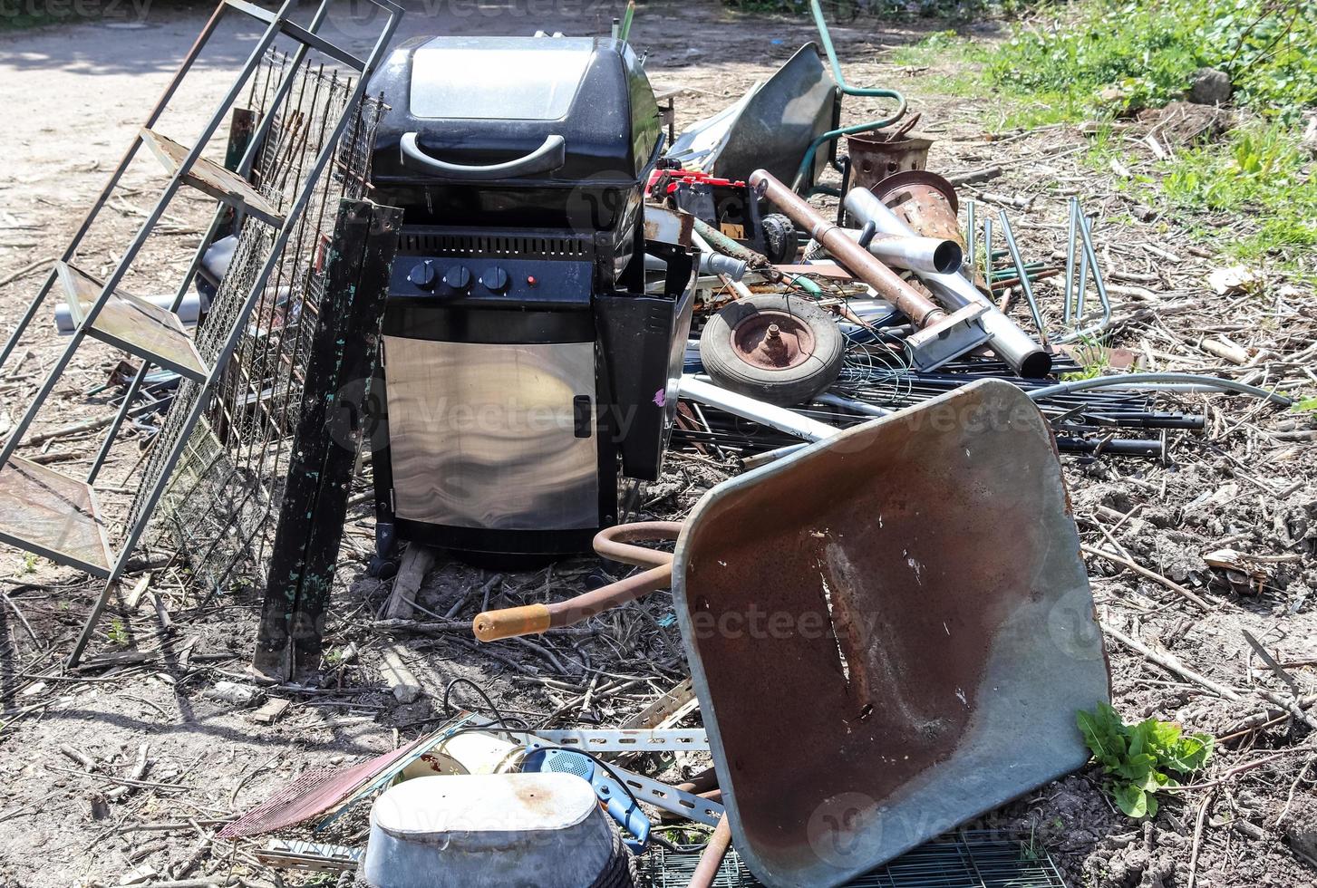 Environmental pollution found at a street where someone dumped its rubbish photo