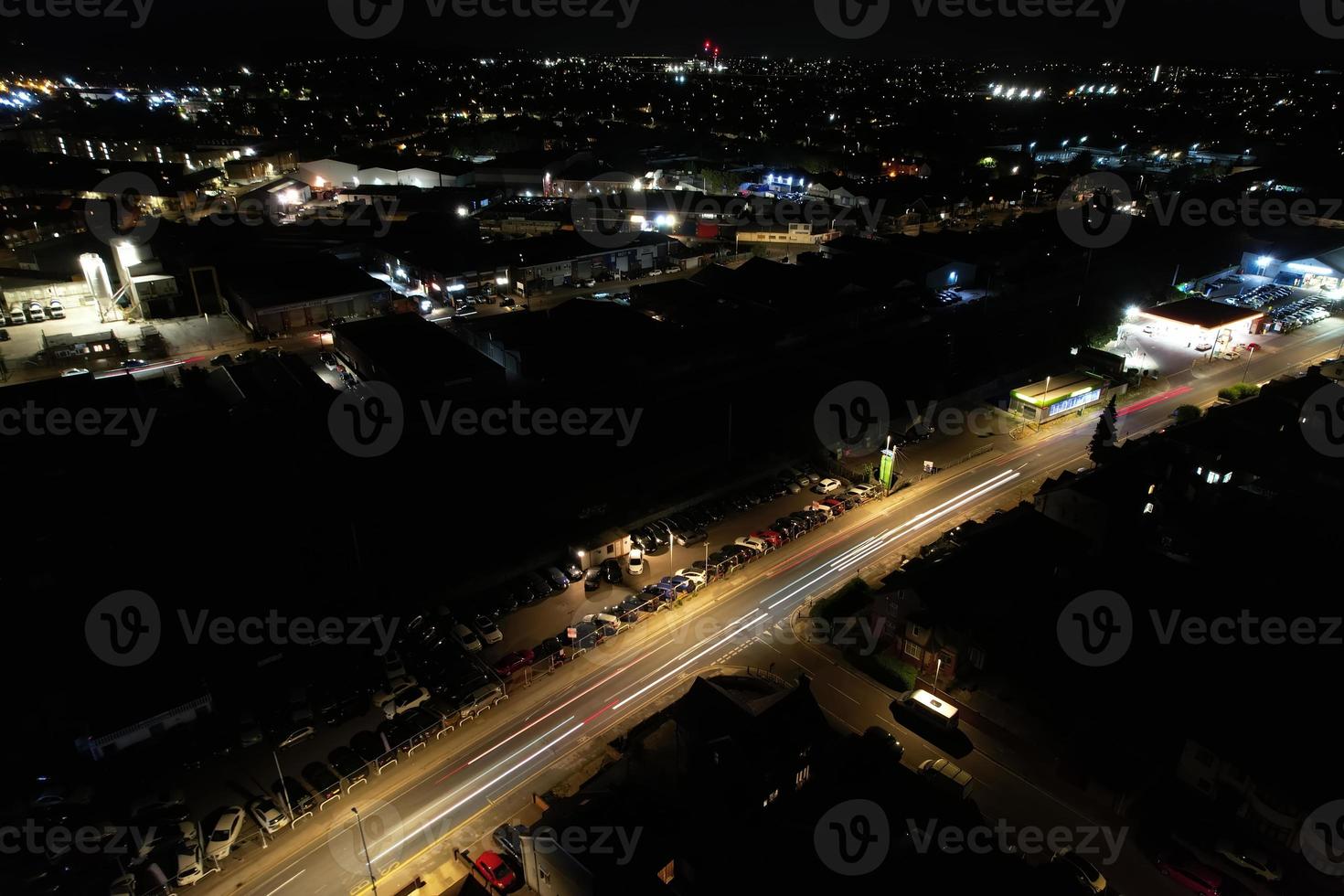 Night Aerial View of Illuminated British City. Drone's Footage of Luton Town of England at Night photo