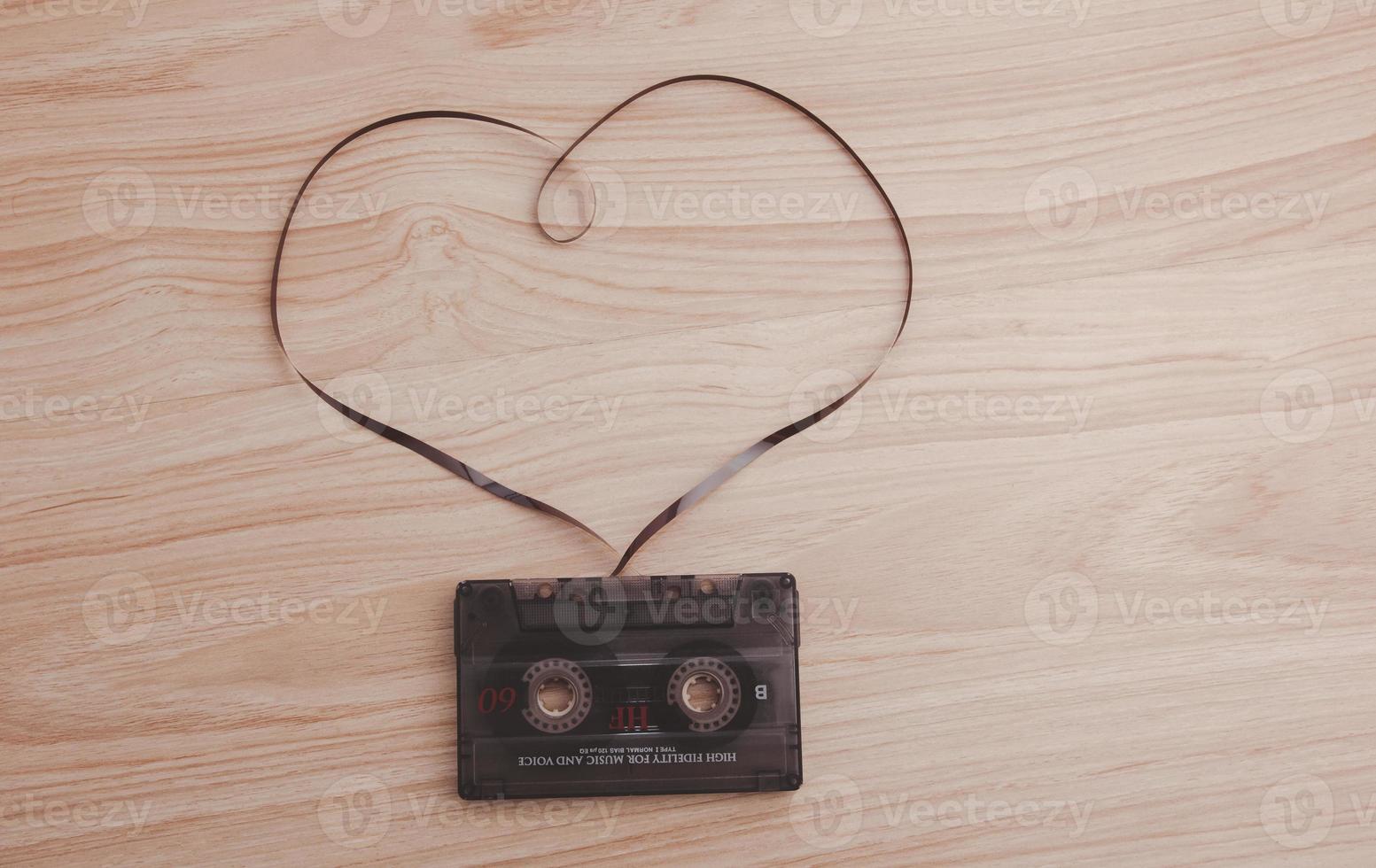 audio cassette with magnetic tape in the shape of a heart, a concept in valentine day. photo