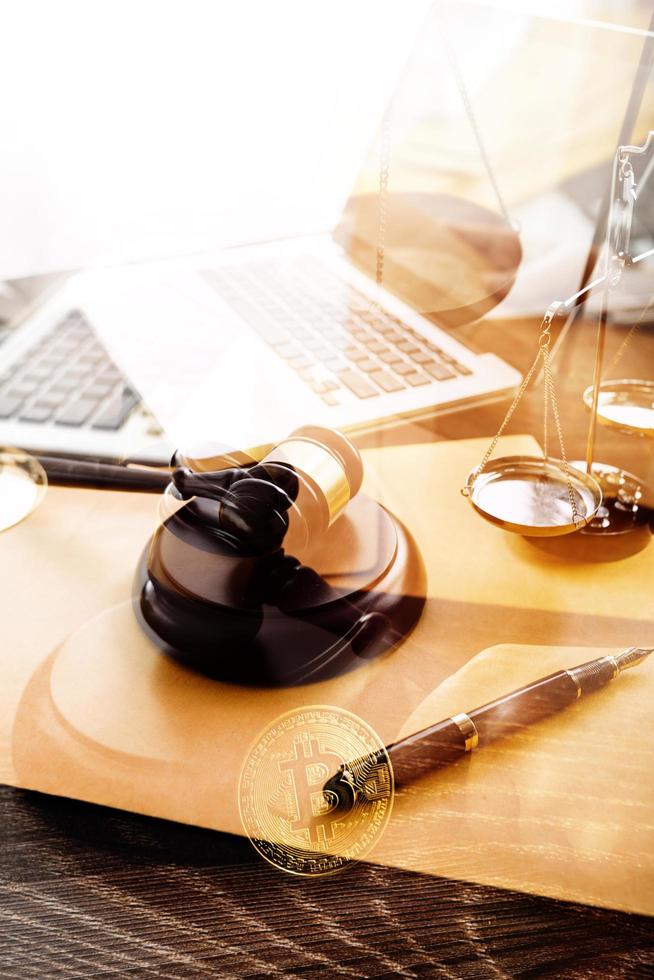 Business and lawyers discussing contract papers with brass scale on desk in office. Law, legal services, advice, justice and law concept picture with film grain effect photo