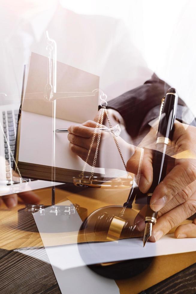 Business and lawyers discussing contract papers with brass scale on desk in office. Law, legal services, advice, justice and law concept picture with film grain effect photo